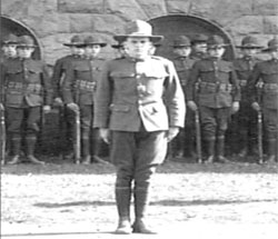 Photo of Davenport High School ROTC members watching a performance at the Armistice Day parade of 1920