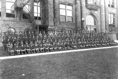 Photo of Davenport High School ROTC members watching a performance at the Armistice Day parade of 1920