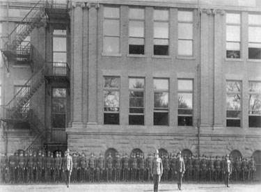 Photo of Davenport High School ROTC members watching a performance at the Armistice Day parade of 1920